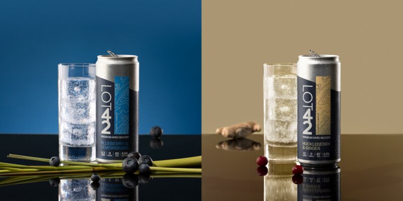 cans of drinks and drink in glasses