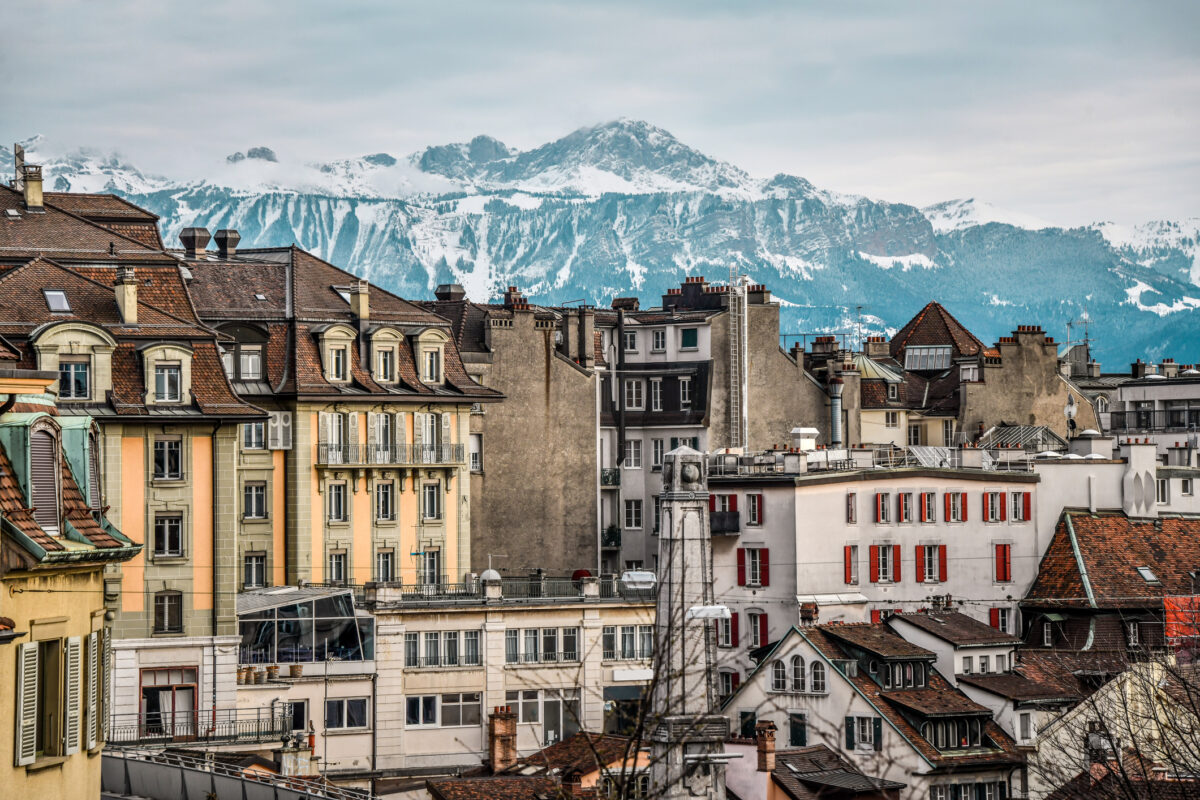 Lausanne cityscape with mountains in background