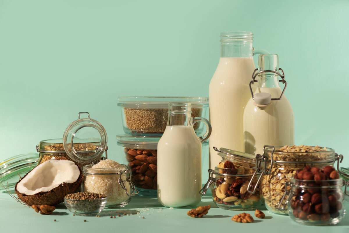 Glass bottles of vegan plant milk