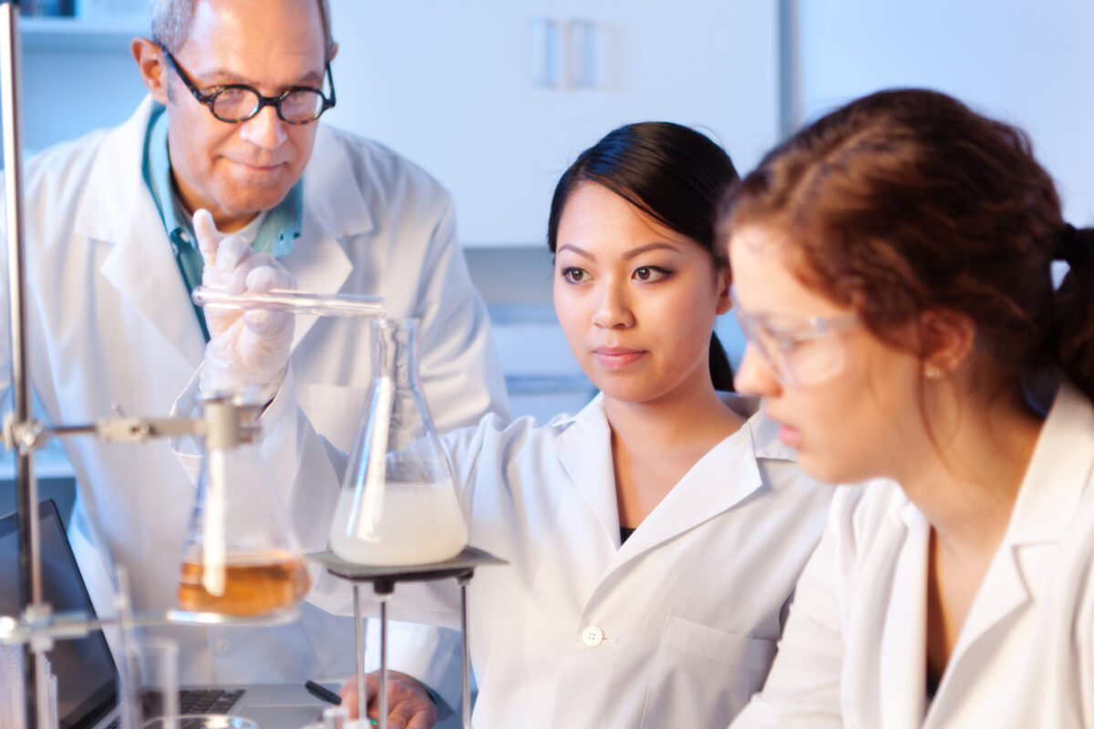 Students in a lab with teacher