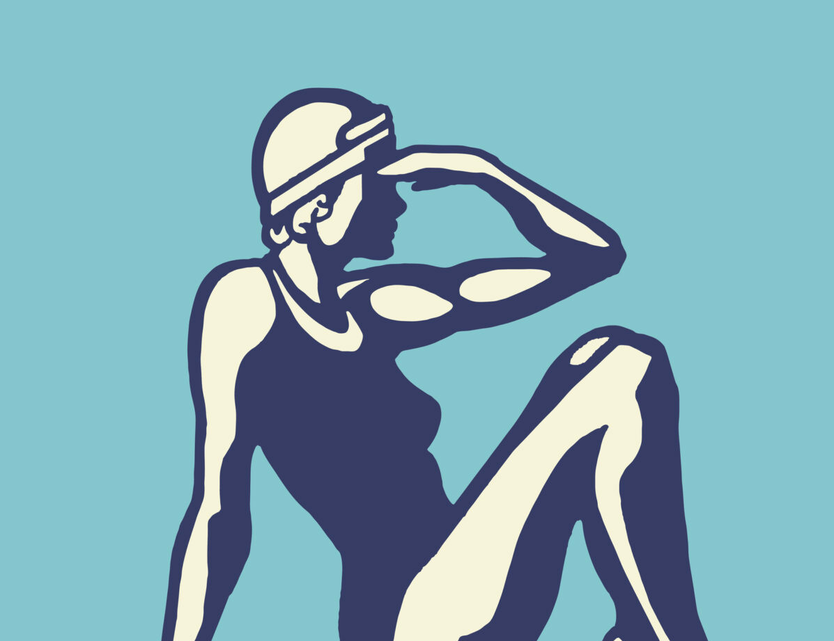 female swimmer sitting on trampoline