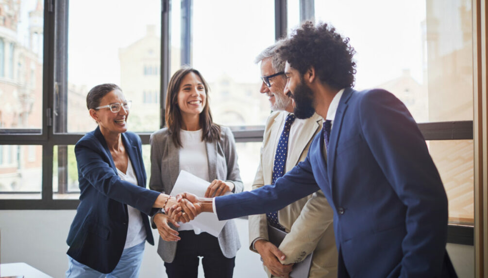 people shaking hands