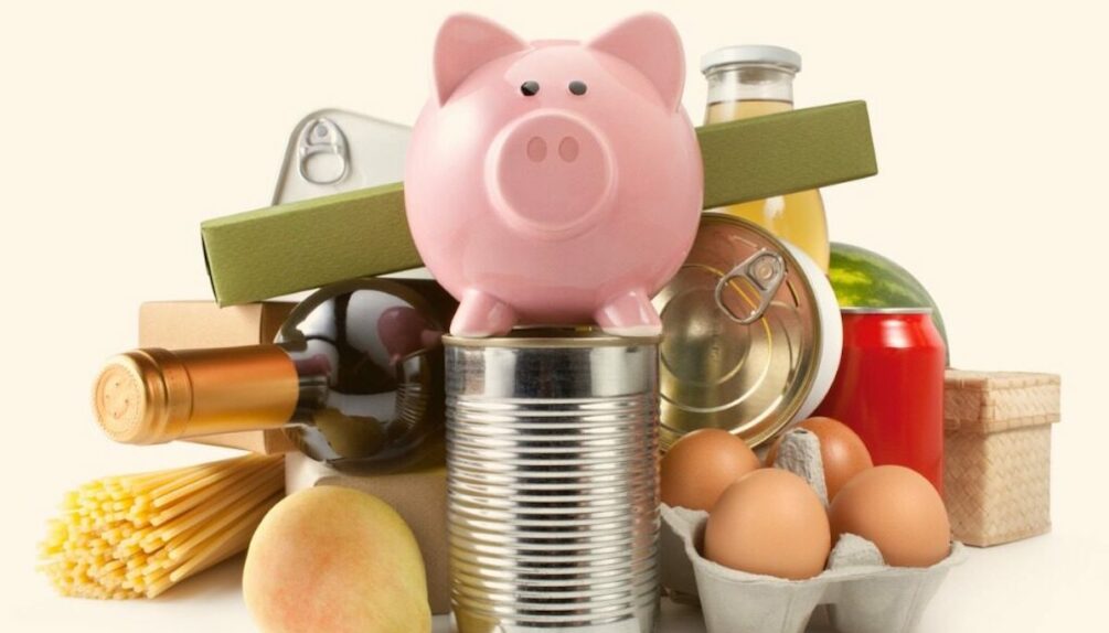 Piggy bank on top of pile of food