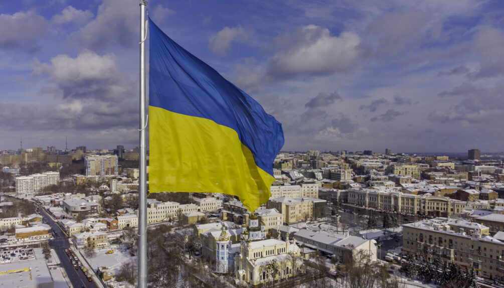 Ukrainian flag in the wind. Blue Yellow flag in the city of Kharkov