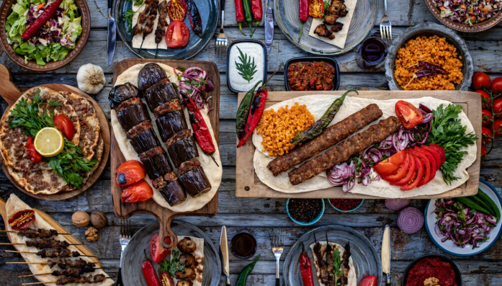 Many types of kebab on the table like adana kebab.