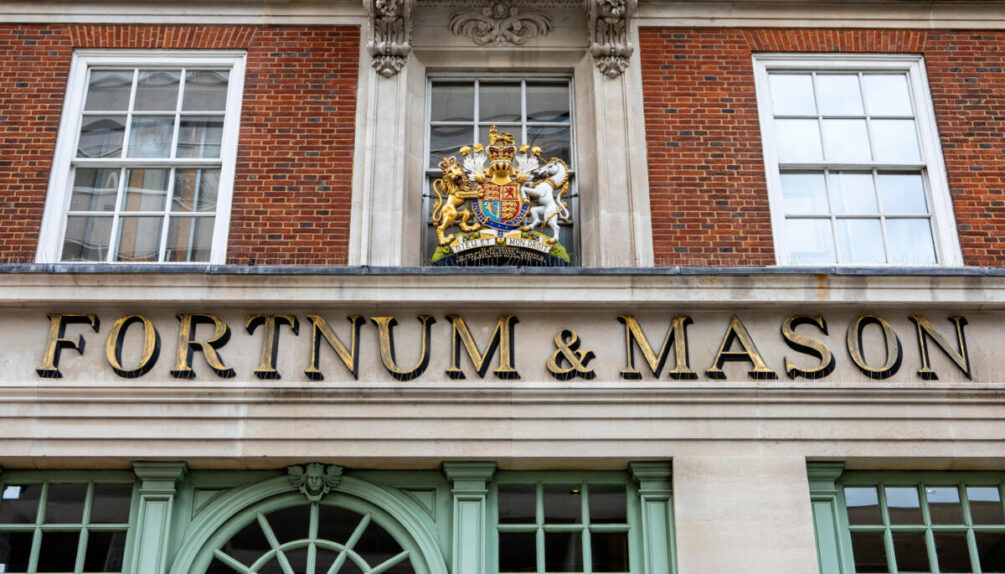 external shot of fortnum & mason store sign, featuring the royal warrant crest