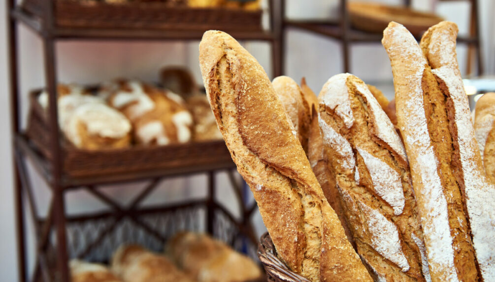 stack of baguettes in a bakery