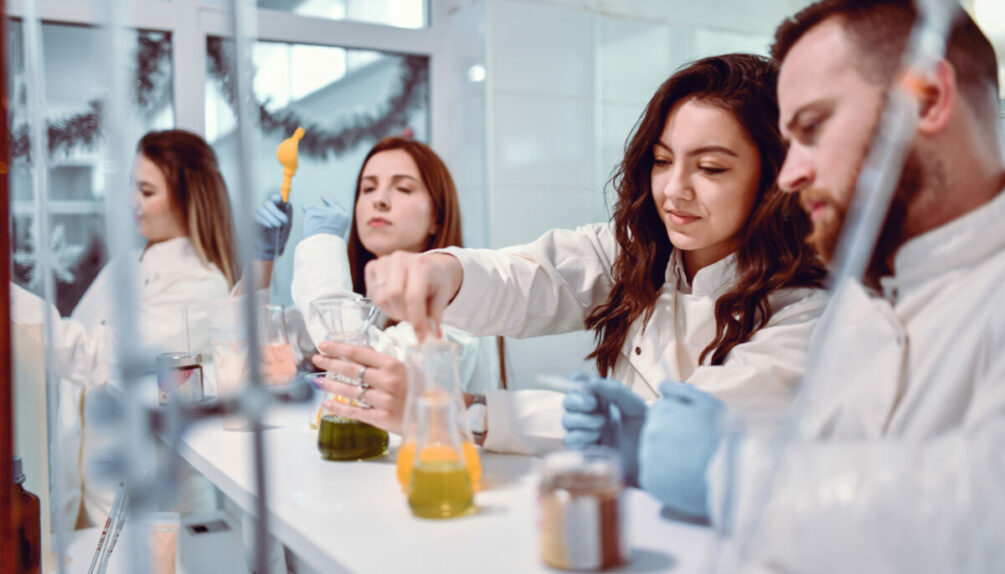 students in lab conducting experiment