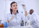 Female bioengineer doing a test with seeds