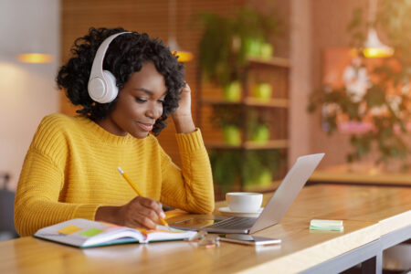 Education Ticket, Food Matters Live, girl at desk, office, headphones