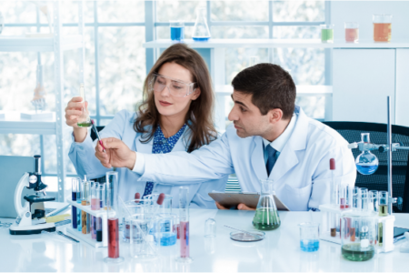 Two people, ingredients, test tubes, scientist, food technologists