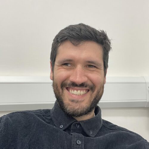 Max Tobias, Managing Director of The Dusty Knuckle Bakery, smiling for the camera