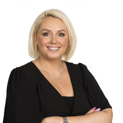 Anne Marie Butler, Edlong, Smiling for the camera on a white background